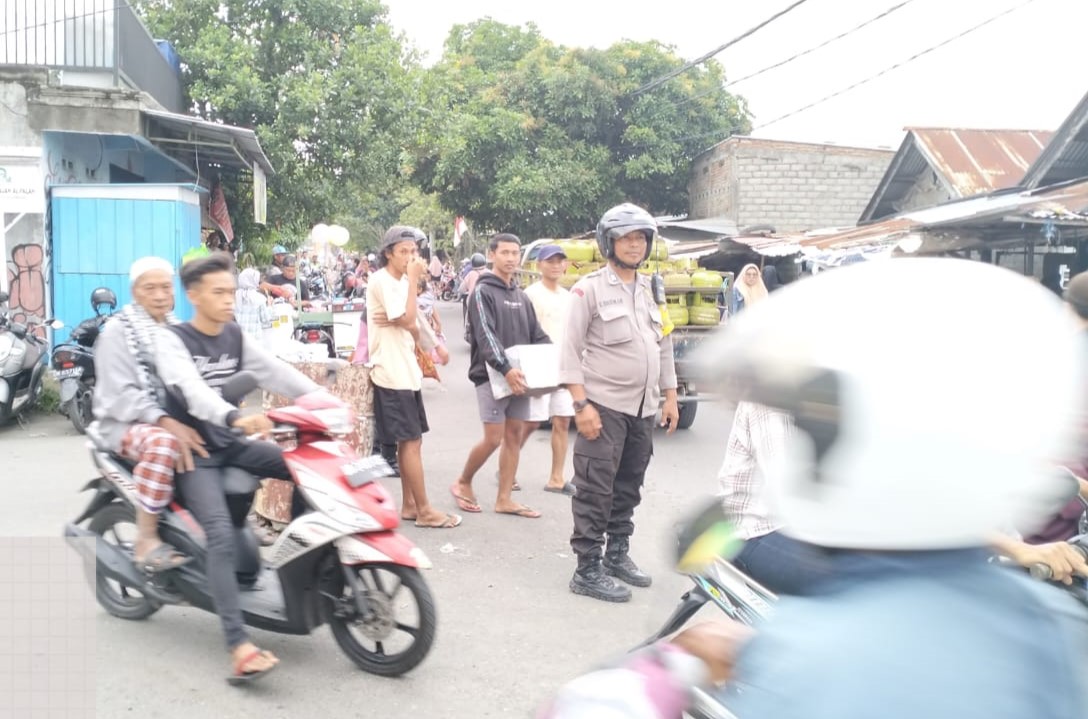 Jelang Puasa Aktifitas di Pasar Paok Kambut Desa Telagawaru Meningkat, Polsek Labuapi Lakukan Pengamanan